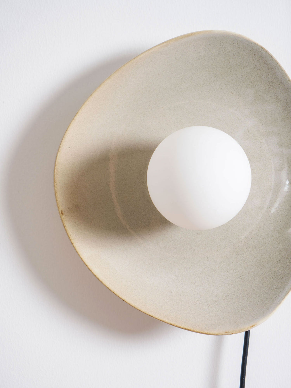 Still Disc Plug-in Wall Light