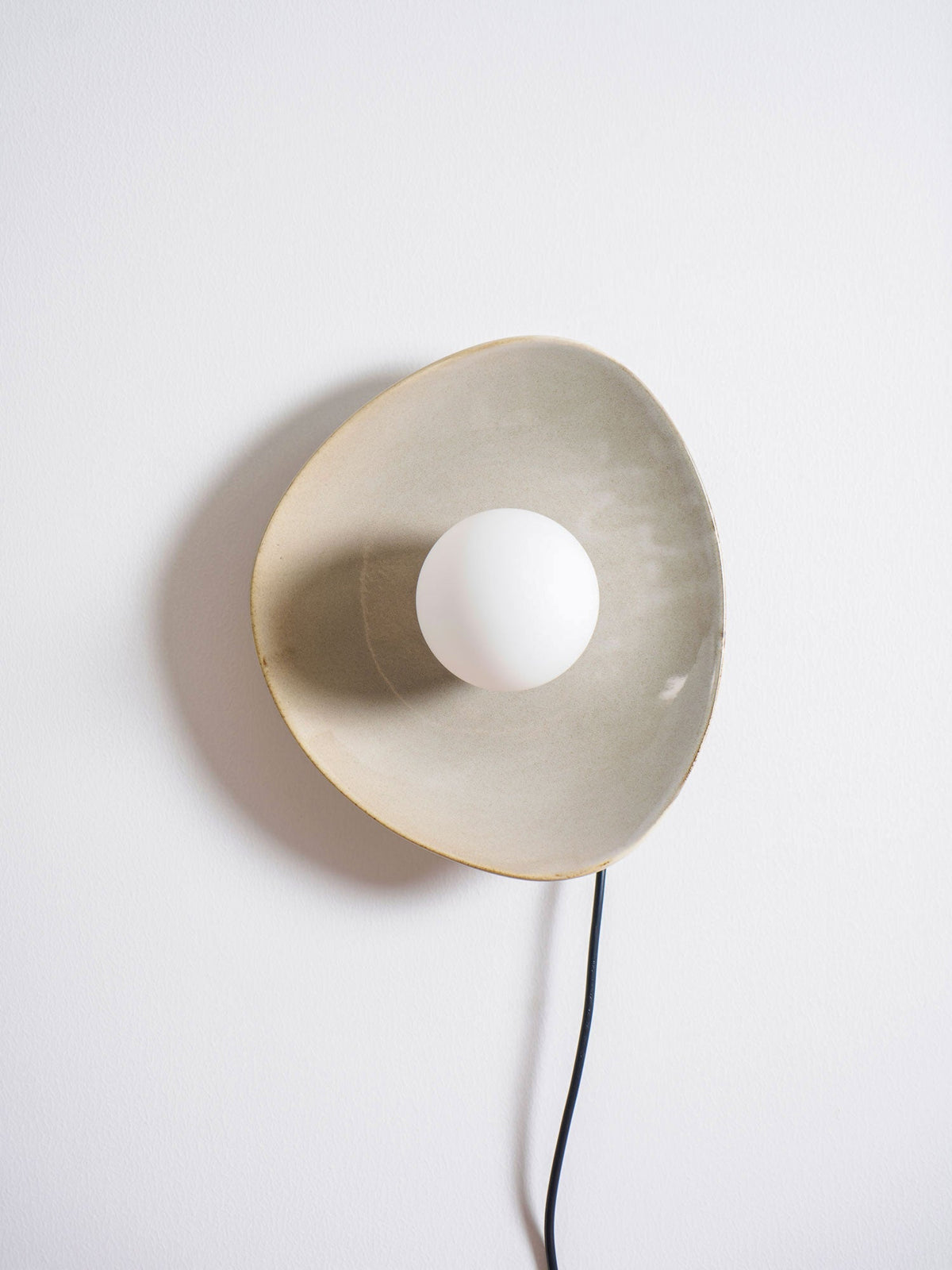 Still Disc Plug-in Wall Light